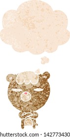 cartoon angry bear with thought bubble in grunge distressed retro textured style