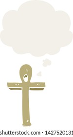 cartoon ankh symbol with thought bubble in retro style