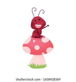 Cartoon Ant Character Sitting on Mushroom and Waving Paw Isolated on White Background Vector Illustration