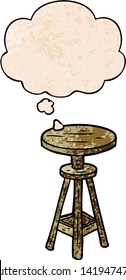 cartoon artist stool with thought bubble in grunge texture style