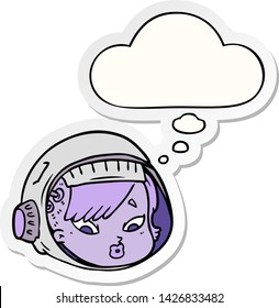 cartoon astronaut face with thought bubble as a printed sticker