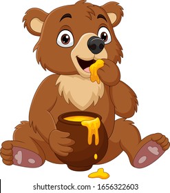 Cartoon baby bear sitting and eating honey from the pot