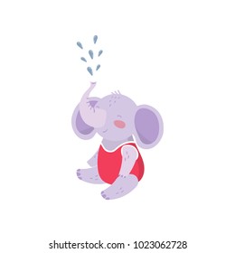 Cartoon baby elephant sitting and spraying water with his trunk. Cute humanized animal with big ears dressed in red swimming suit. Colorful flat vector design