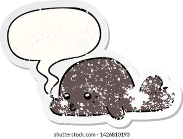 cartoon baby seal with speech bubble distressed distressed old sticker