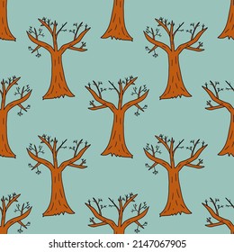 Cartoon bare winter tree in doodle style seamless pattern.  Winter forest background.