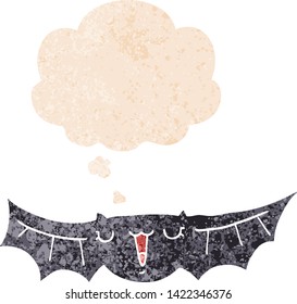 cartoon bat with thought bubble in grunge distressed retro textured style