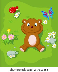 Cartoon bear lying down on the grass