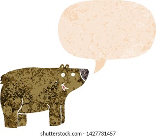 cartoon bear with speech bubble in grunge distressed retro textured style