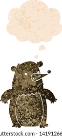 oso de caricatura con burbuja de pensamiento en un estilo retro angustiado y con textura de grosero