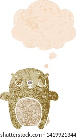 cartoon bear with thought bubble in grunge distressed retro textured style