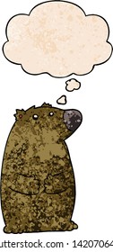 cartoon bear with thought bubble in grunge texture style