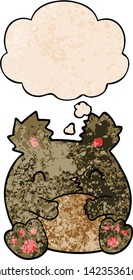 cartoon bear with thought bubble in grunge texture style