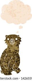 oso de caricatura con burbuja de pensamiento en un estilo retro angustiado y con textura de grosero
