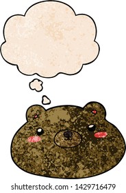 cartoon bear with thought bubble in grunge texture style