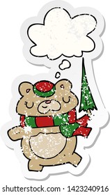 cartoon bear with umbrella with thought bubble as a distressed worn sticker