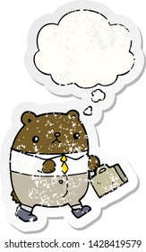 cartoon bear in work clothes with thought bubble as a distressed worn sticker