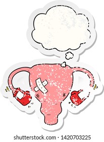 cartoon beat up uterus with boxing gloves with thought bubble as a distressed worn sticker