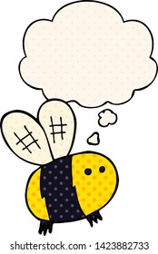cartoon bee with thought bubble in comic book style