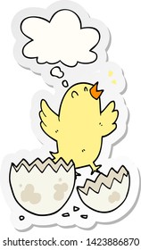 cartoon bird hatching from egg with thought bubble as a printed sticker