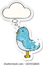 cartoon bird with thought bubble as a distressed worn sticker