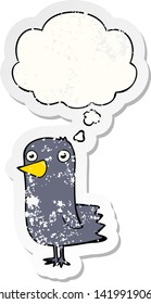 cartoon bird with thought bubble as a distressed worn sticker
