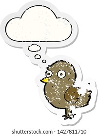 cartoon bird with thought bubble as a distressed worn sticker