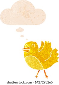 cartoon bird with thought bubble in grunge distressed retro textured style