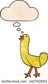 cartoon bird with thought bubble in grunge texture style