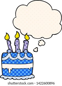 cartoon birthday cake with thought bubble in comic book style