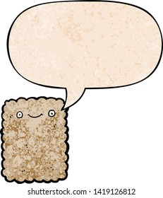 cartoon biscuit with speech bubble in retro texture style