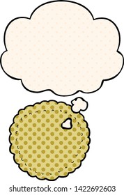 cartoon biscuit with thought bubble in comic book style