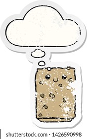 bizcocho de dibujos animados con burbuja de pensamiento como pegatina gastada angustiada