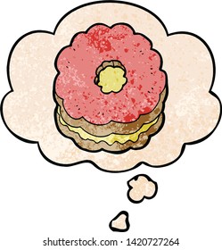 cartoon biscuit with thought bubble in grunge texture style
