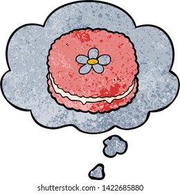cartoon biscuit with thought bubble in grunge texture style