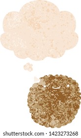 cartoon biscuit with thought bubble in grunge distressed retro textured style