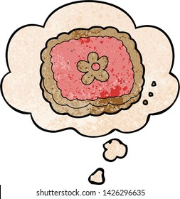 cartoon biscuit with thought bubble in grunge texture style