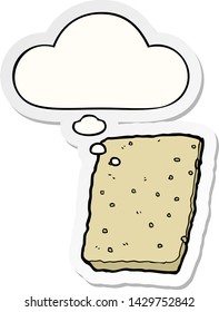 cartoon biscuit with thought bubble as a printed sticker