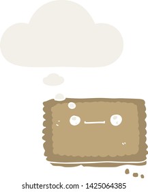 cartoon biscuit with thought bubble in retro style