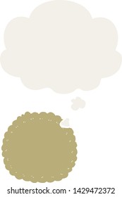 cartoon biscuit with thought bubble in retro style