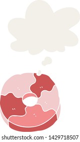 cartoon biscuit with thought bubble in retro style