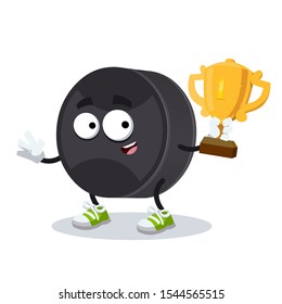 cartoon black rubber hockey puck mascot holds the number one cup on white background