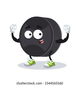 cartoon black rubber hockey puck mascot shows its strength on a white background