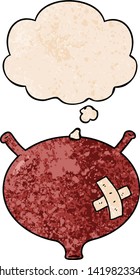 cartoon bladder with thought bubble in grunge texture style