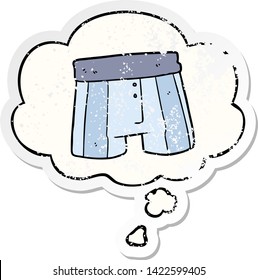 pantalones cortos de boxeador de dibujos animados con burbuja de pensamiento como pegatina desgastada angustiada