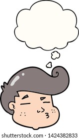 cartoon boy's face with thought bubble