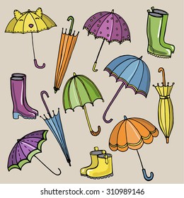 Cartoon bright accessories for rainy weather - umbrellas and gumboots.Vector illustration.