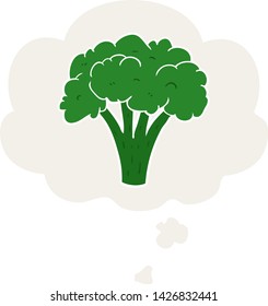 cartoon brocoli with thought bubble in retro style