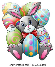 Cartoon bunny with big easter eggs on a white background