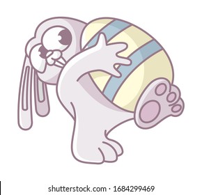 Cartoon bunny carries a golden easter egg. colorful design of an easter bunny white background 
