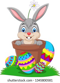 Cartoon bunny in the pot with easter eggs on the grass